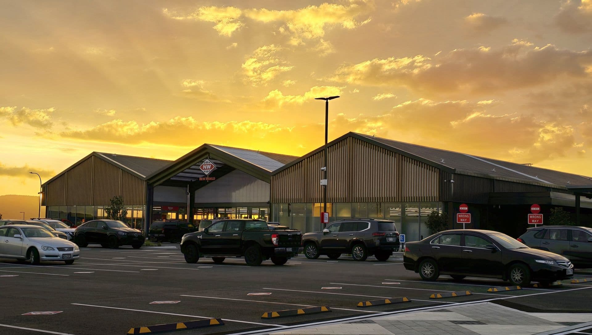 New World supermarket at The Sands, Papamoa Beach, at sunset